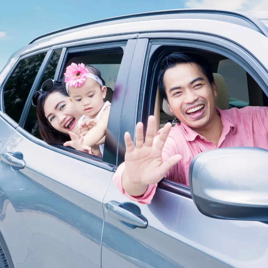 Happy family in a car, symbolizing secure auto insurance by AnchorPoint Ins in Chesterton, IN
